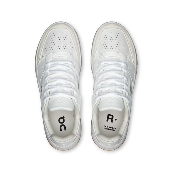 White sneaker with brown sole on a white background