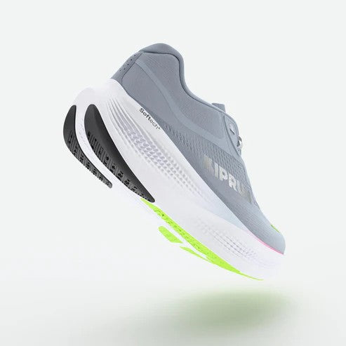 Gray running shoe with white sole and green accents on a light gray background