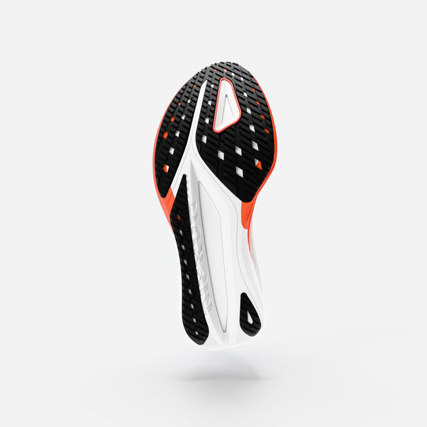 Black and white shoe sole with orange accents on a light gray background