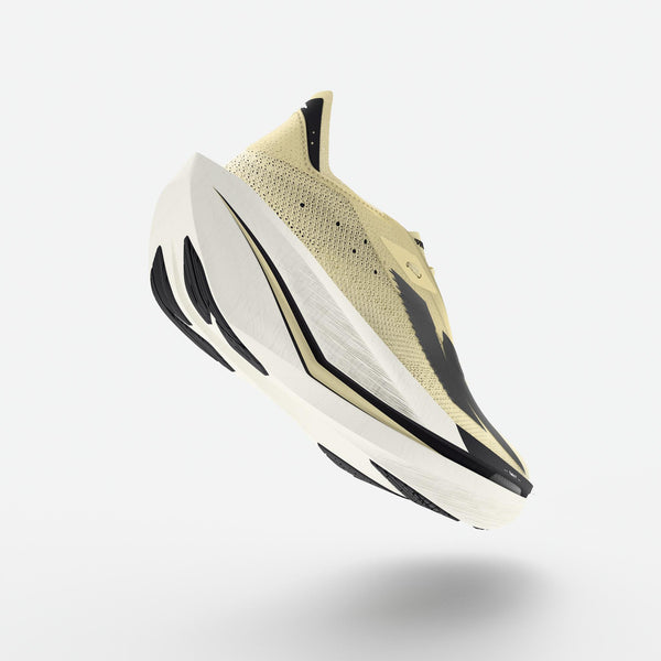 Yellow running shoe on a light gray background