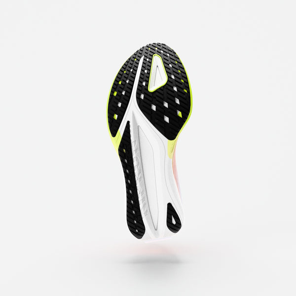 Shoe sole with black, white, and yellow design on a light gray background