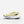 Yellow trail running shoe with white sole on a light gray background