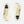 Pair of light yellow sneakers with black accents on a white background