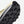 Close-up of a shoe sole with tread pattern on a light background
