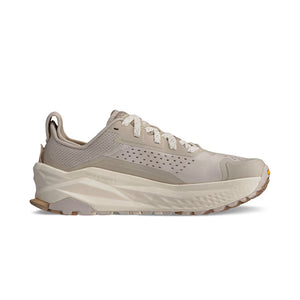 Beige running shoe on a white background