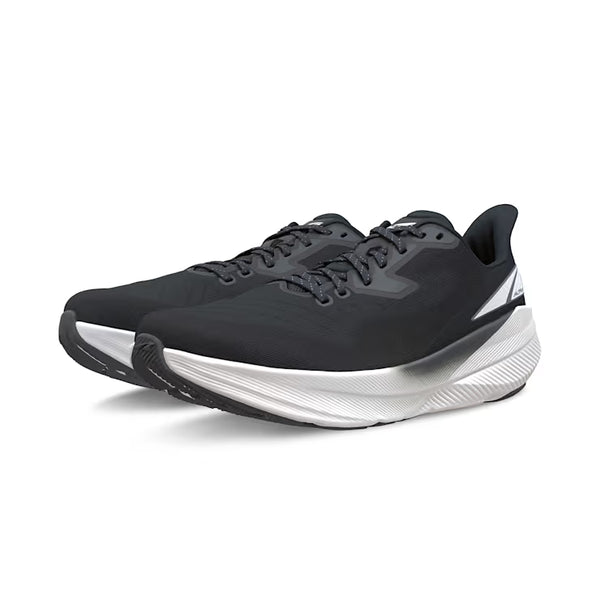 Black running shoe with white sole on a light gray background