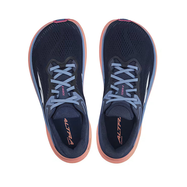 Navy running shoes with pink accents on a white background
