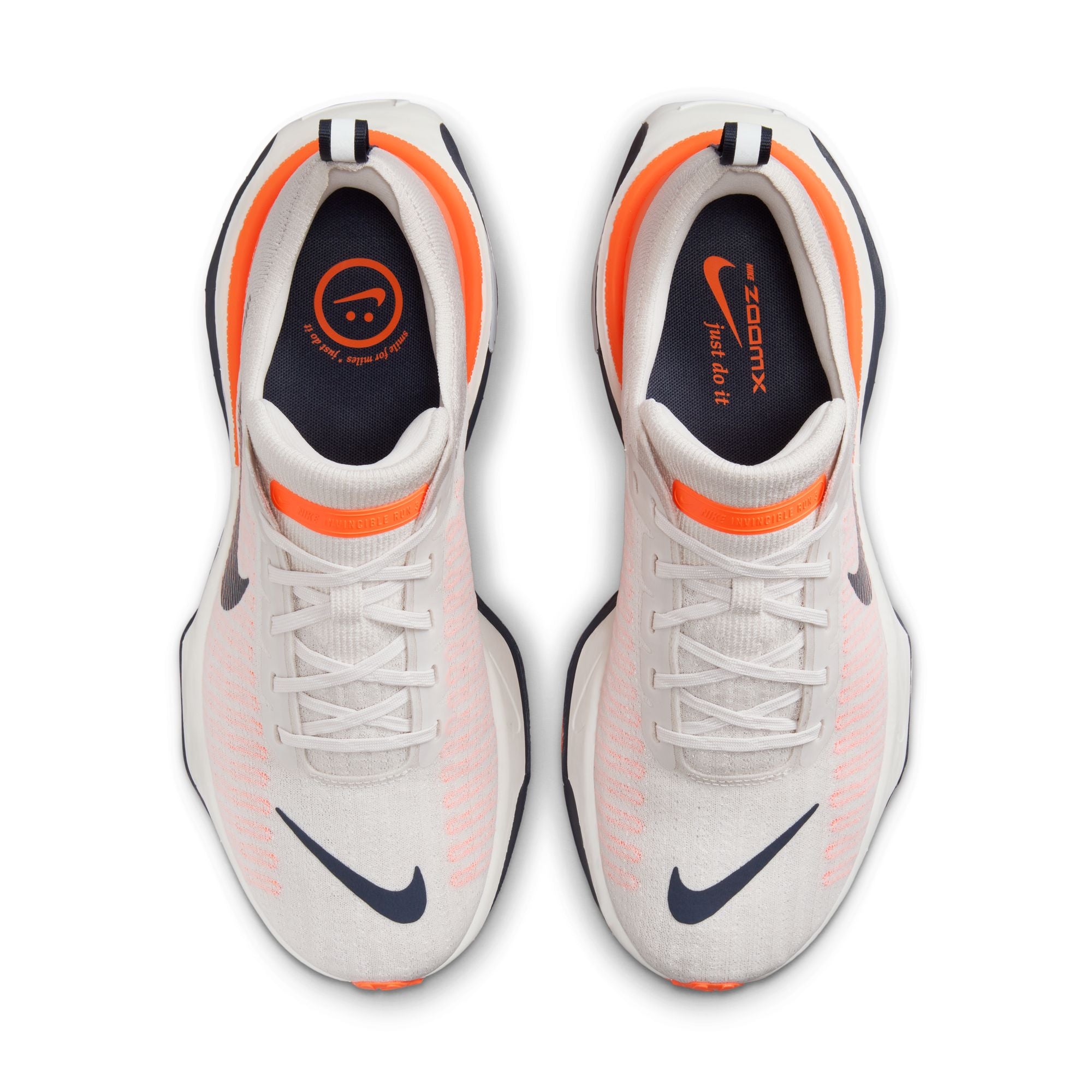 This Nike Invincible 3 has a swoosh right above the toe box on both shoes