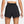Black athletic shorts worn by a person on a white background