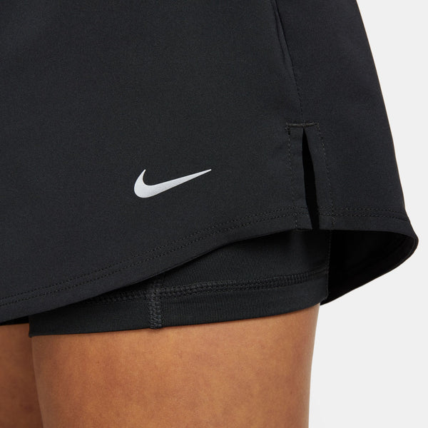 Black athletic shorts with a Nike logo on a neutral background