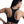 Black sports bra worn by a person on a white background