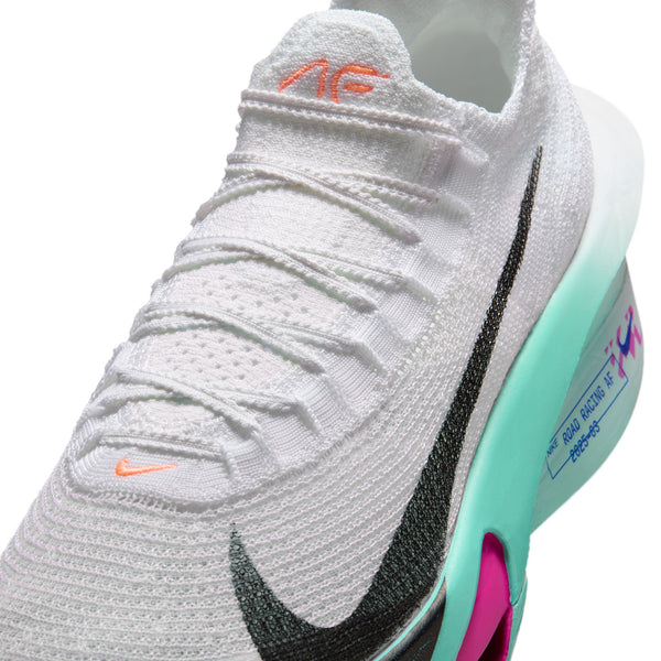Close-up of a white sneaker with colorful accents on a white background