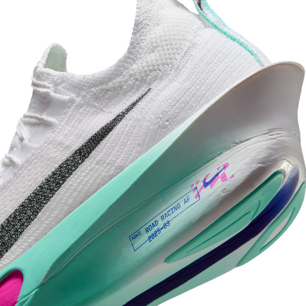 Close-up of a white and teal athletic shoe with text on a white background