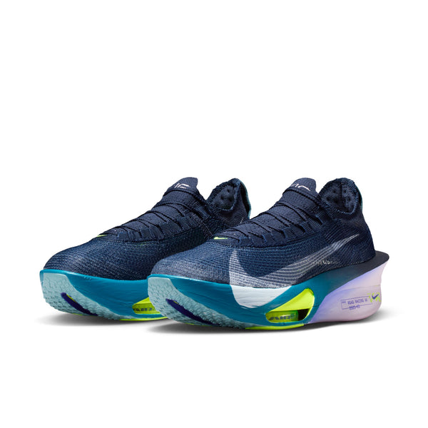 Blue athletic shoes with a prominent Nike logo on a white background.