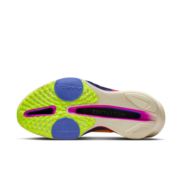 Colorful Nike running shoe sole with purple, green, and pink accents on a white background.