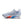 Women's Nike white running shoe with blue and red accents on a white background.