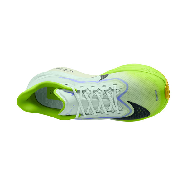 Green and white athletic shoe on a white background
