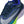 Gray and blue running shoe with Nike Zoom Fly branding on a white background.