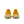 The heel area of a women's nike yellow athletic shoes with a focus on sole design on a white background.