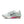 Medial side of a white running shoe with black swoosh logo on a white background.