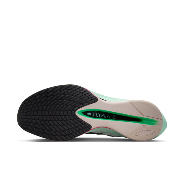 Side view of a running shoe with 'Flyplate' technology on a white background.