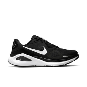 Black and white running shoe with Nike logo on a white background.