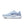 Medial side of a lght blue running shoe with Nike logo on a white background.