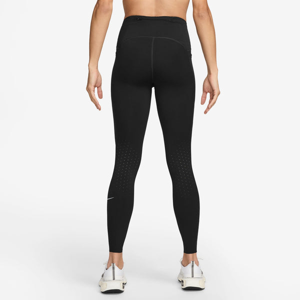 Black leggings worn by a person on a white background