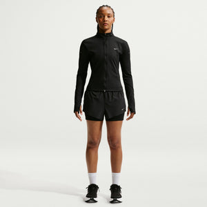 Person wearing a black athletic outfit on a white background