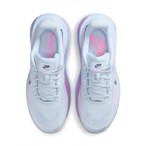 White running shoes with pink accents on a white background.