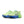 Pair of neon green and blue running shoes on a white background