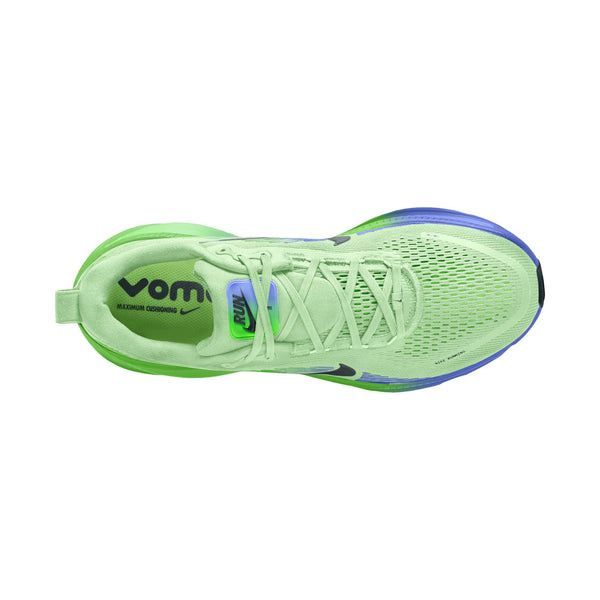 Green running shoe with visible brand logo on a white background
