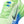 Neon green running shoe with blue accents on a white background