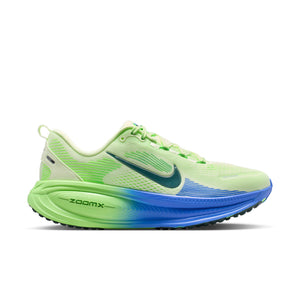 Green and blue running shoe with Nike logo on a white background