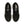 Nike black and white running shoes with white soles on a white background.