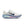 White running shoe with blue sole on a white background