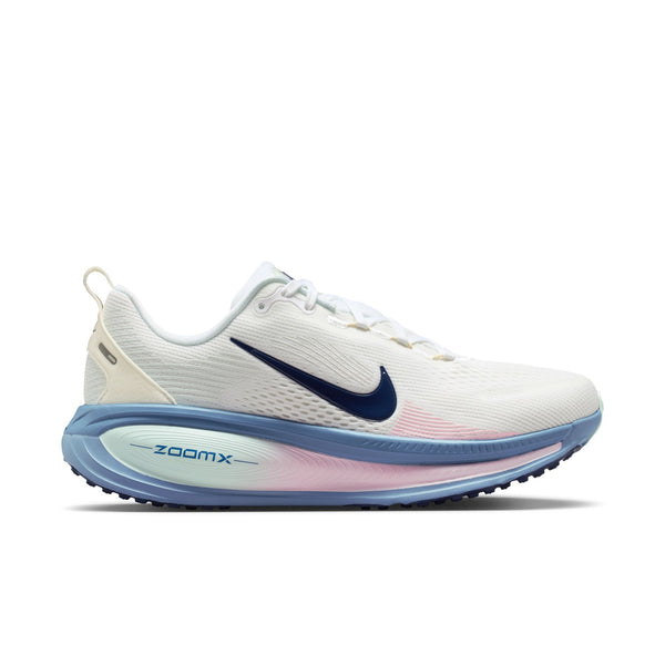 White running shoe with blue sole on a white background