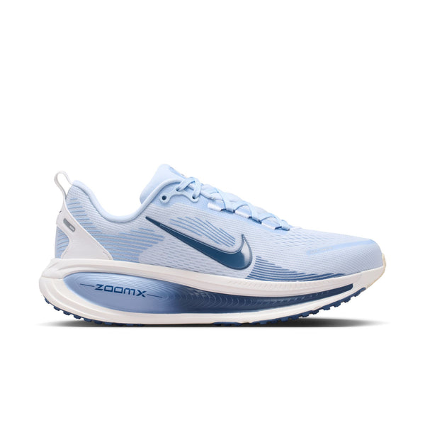 Blue running shoe with white sole on a white background