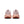 Pair of pink running shoes with Nike logo on a white background.