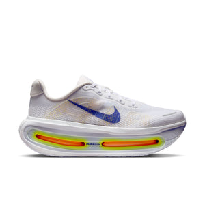 White Nike running shoe with a blue swoosh and large Air Zoom units.