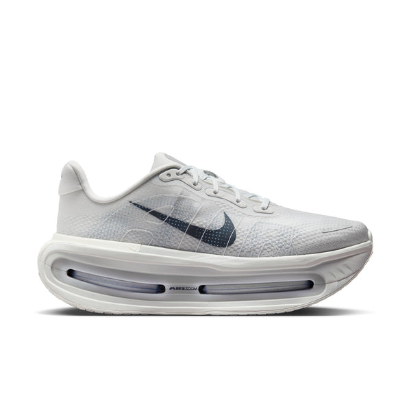 The medial side of a Nike Vomero Premium running shoe with a tonal written "AIR" right in the middle.