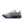 White running shoe with blue sole on a white background