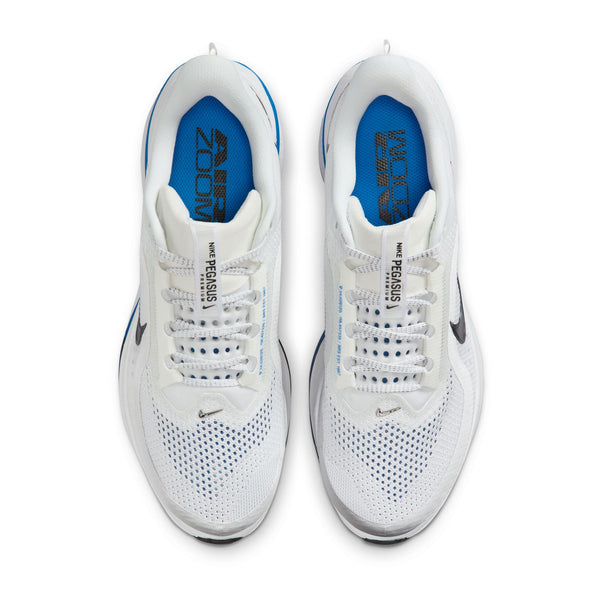 A pair of Nike running and lifestyle shoes with a blue footbed.