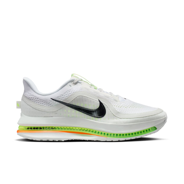White running shoe with colorful sole on a white background