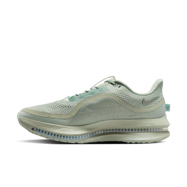Light gray running shoe with Nike logo on a white background.