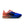 Multicolored running shoe with gradient design on a white background