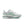 Mostly white Nike runing shoe with metallic swoosh near the heel.