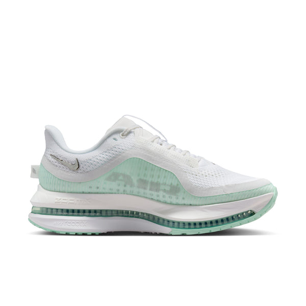 Mostly white Nike runing shoe with metallic swoosh near the heel.