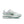 White and green sneaker with Nike logo on a white background