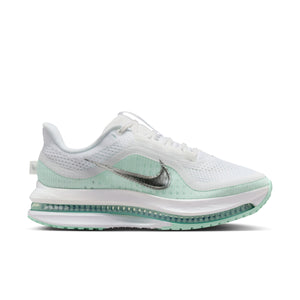 White and green sneaker with Nike logo on a white background